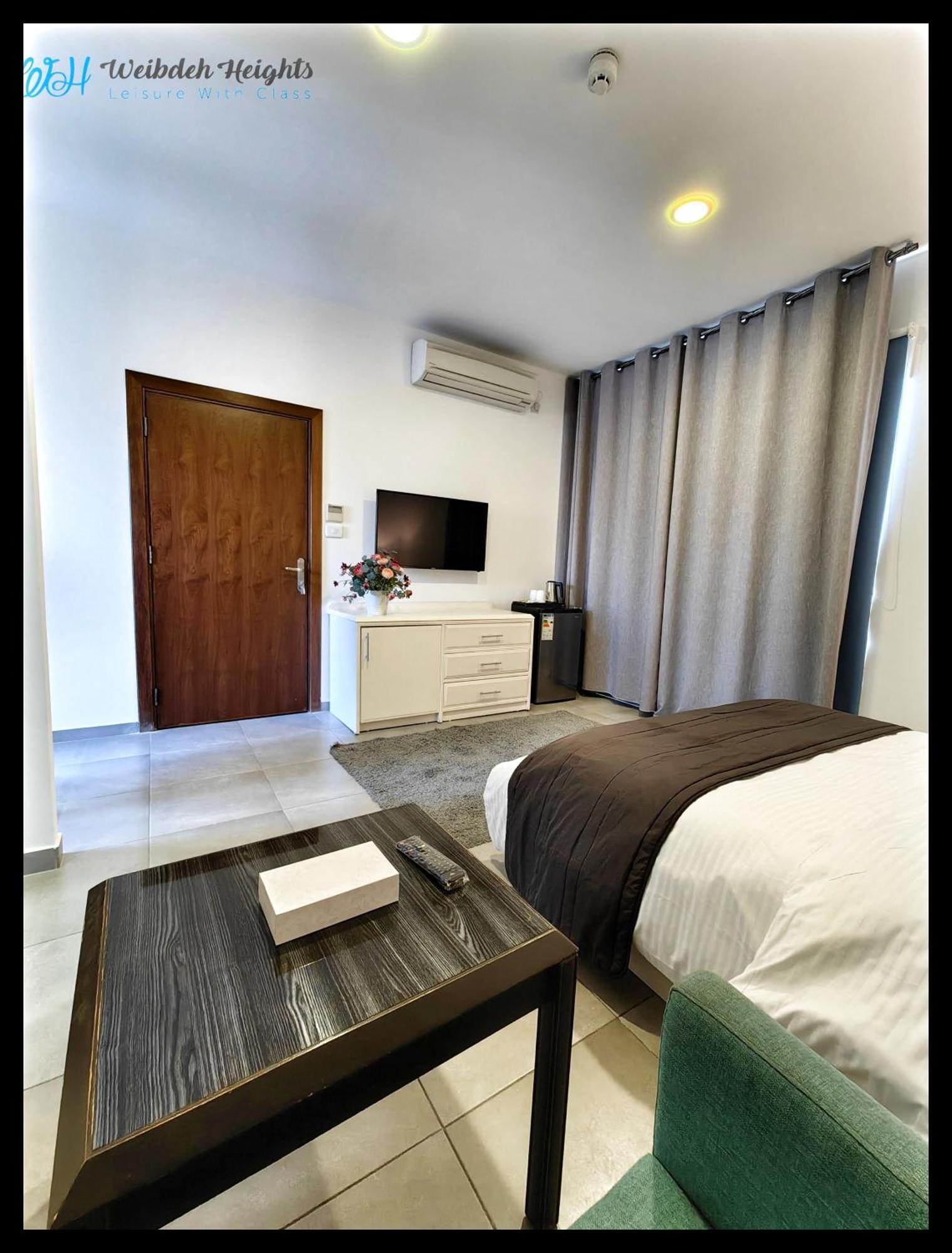 Weibdeh Heights Hotel Suites Амман Экстерьер фото